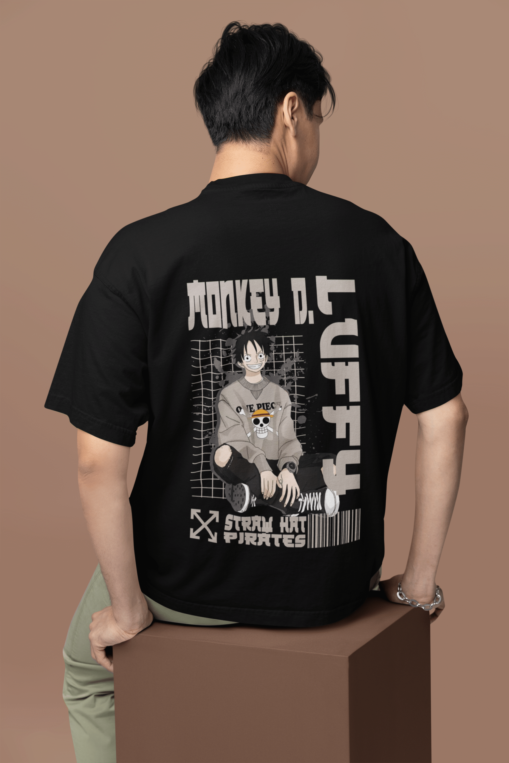 back-view-oversized-tee-mockup-of-a-man-sitting-on-a-customizable-cube-m38922_66-1 Next-Gen Pirate Vibes Luffy oversized anime streetwear tee